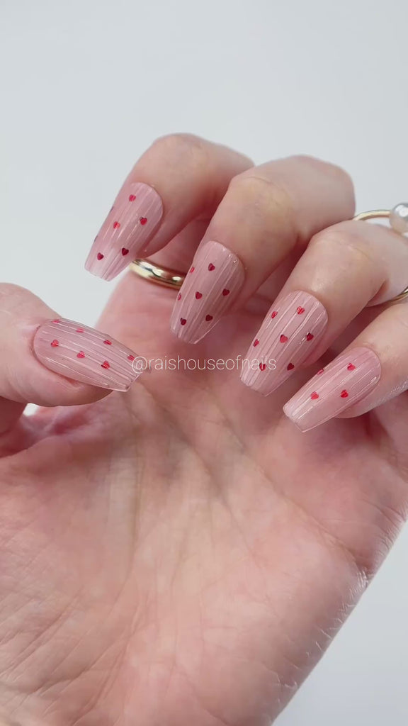 Video showing Rai's House of Nails press on nails in motion