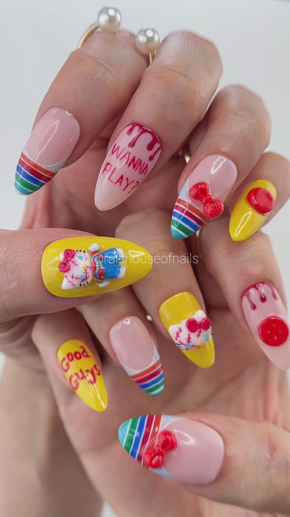 Video showing Rai's House of Nails killer doll press on nails in motion, with the sculpted white kitten charm, bow, and glossy blood drop details catching the light.