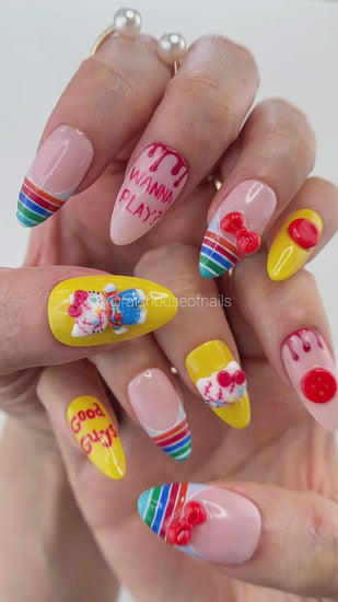 Video showing Rai's House of Nails killer doll press on nails in motion, with the sculpted white kitten charm, bow, and glossy blood drop details catching the light.